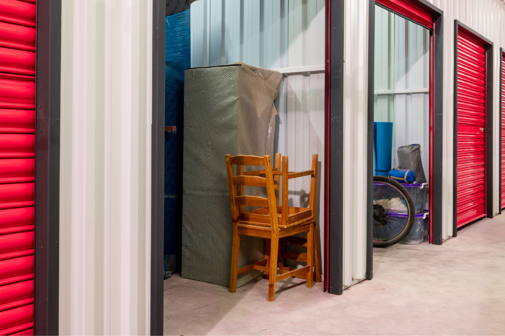  A storage unit featuring red doors, designed to maximize storage space efficiently.